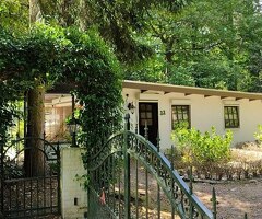 Mooie bungalow / vakantiewoning met groot perceel te koop